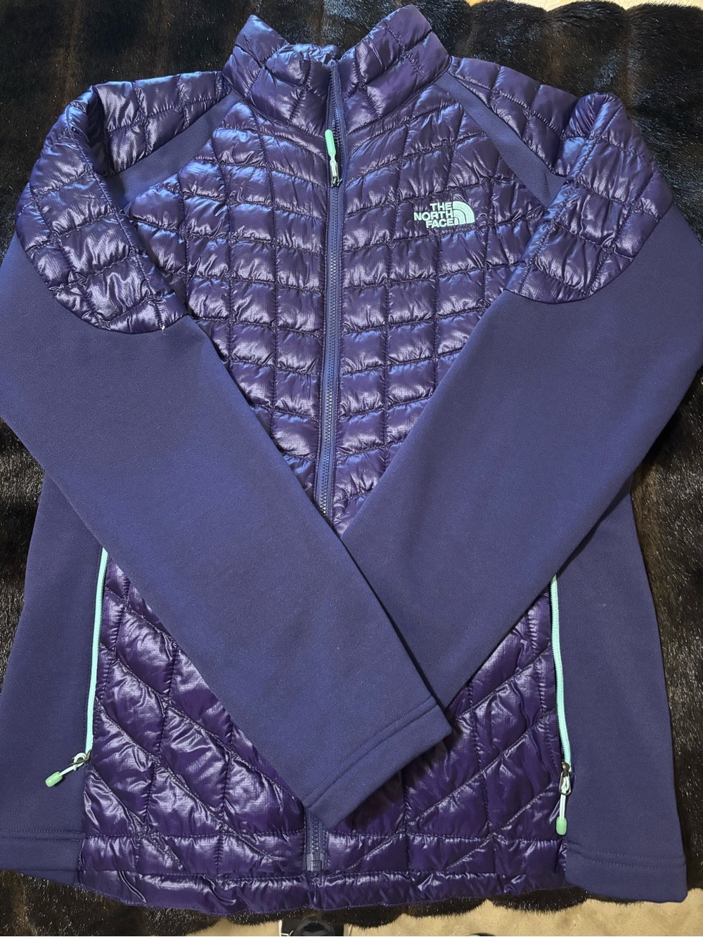The North Face purple quilted jacket with mint trim Medium
